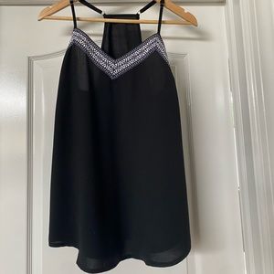Women’s black tank with white embroidered v-neck size L